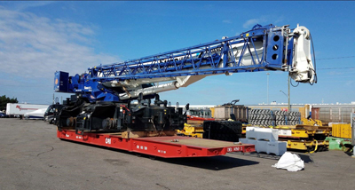 Export Logistics & Shipping, Inc. in house crane crew  inspects Tadano GR1000XL-5 crane with jib booma nd swing away